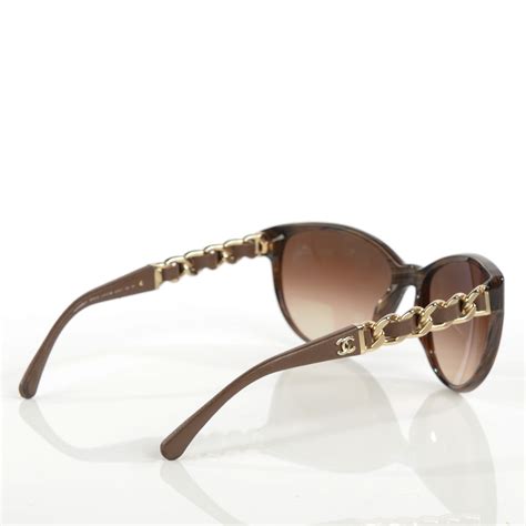 chanel sunglasses leather chain|Chanel sunglasses with on side.